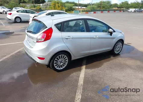 2015 Ford Fiesta Titanium z USA, uszkodzony, nr VIN 3FADP4FJ7FM133662
